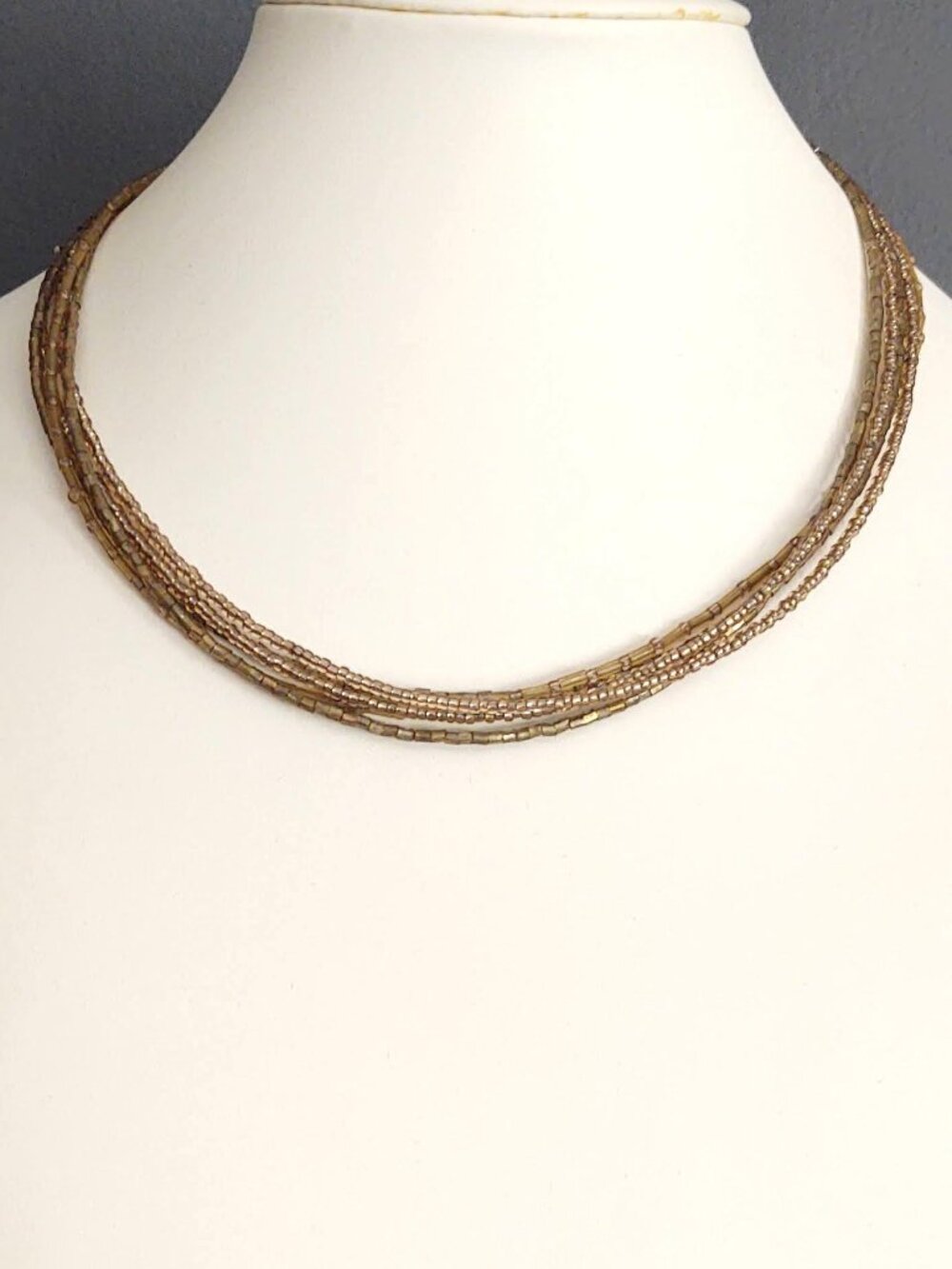 Gold seed and bugle bead multi strand necklace